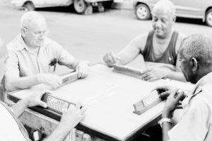 Men Playing Dominoes in the Street, Havana, Cuba