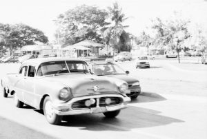 Classic Cars Glide By, Havana, Cuba