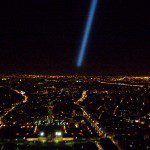 Light Beam Shine Atop Eiffel Tower, Paris